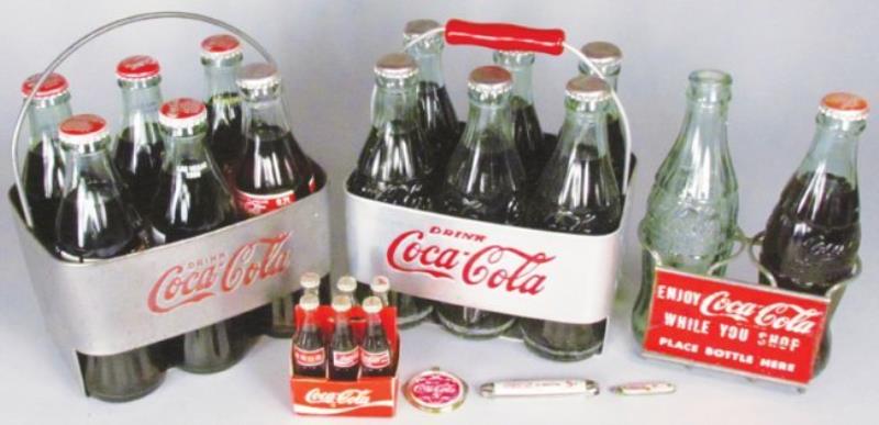 Collection of Coca Cola Bottle Items