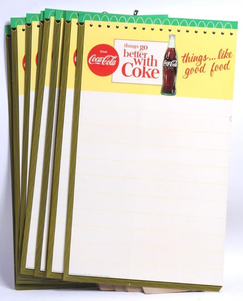 GROUP OF 9 1960'S COCA-COLA CARDBOARD SIGNS