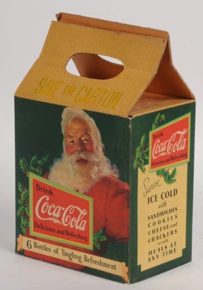 1931 COCA-COLA BOTTLE CARRIER AND SANTA SLEEVE