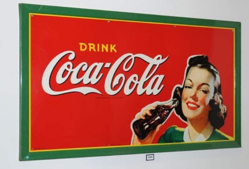 1942 COCA-COLA TIN SIGN WITH GIRL