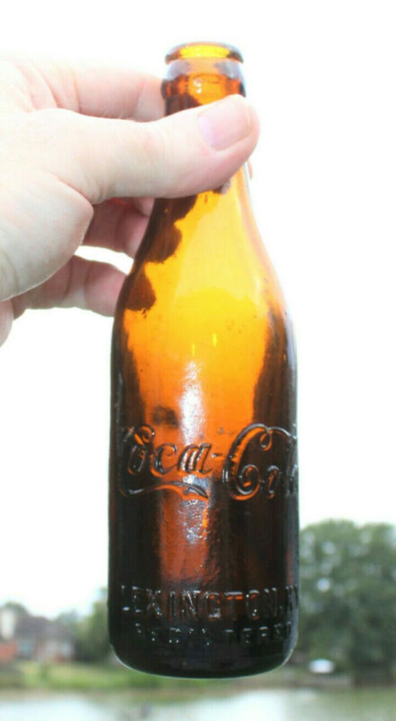 amber-coca-cola-straight-sided-bottles-value-price-guide