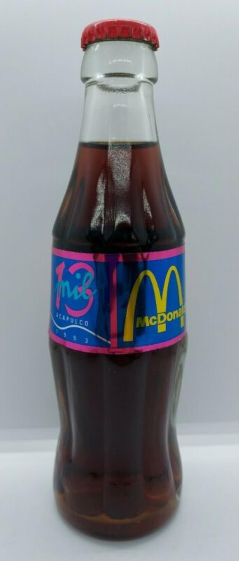 1993 COCA-COLA/MCDONALDS 8OZ BOTTLE W/FOIL LABEL-CELEBRATING ACAPULCO SALES