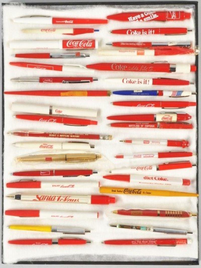 Approximately 35 Coca-Cola Pens & Pencils