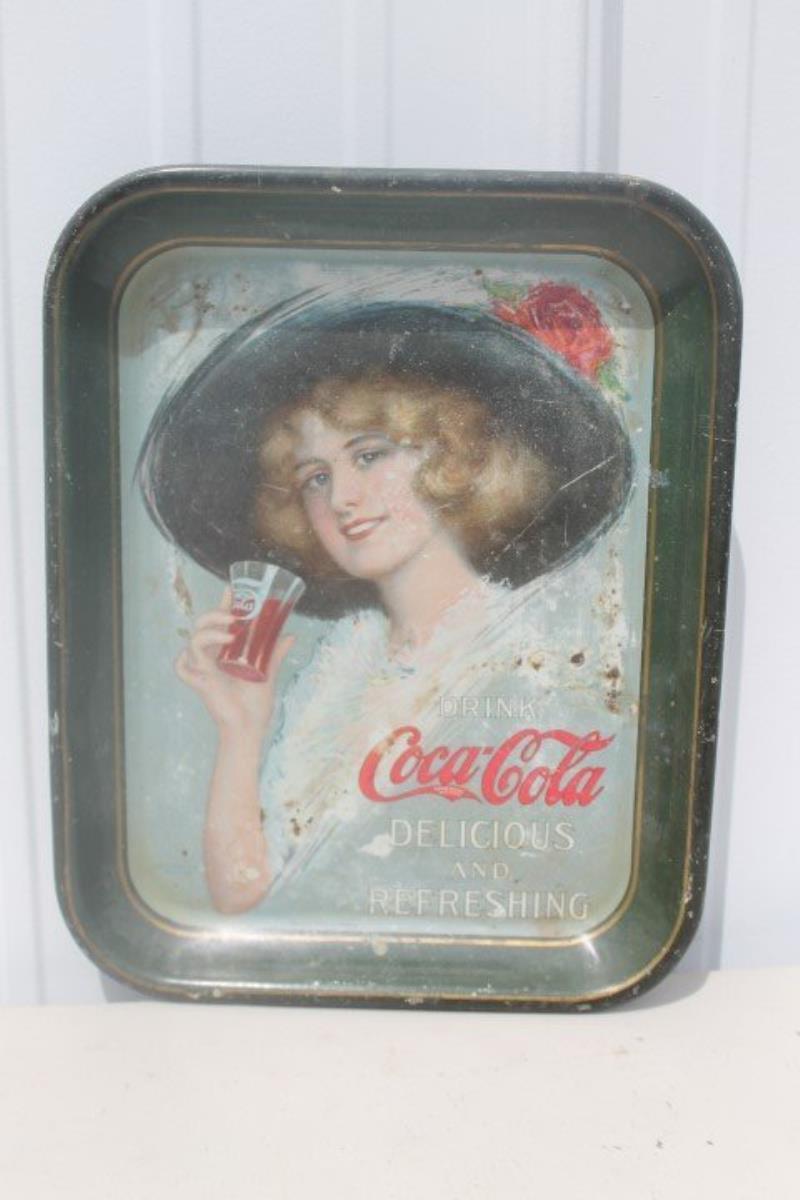 1913 Coca-Cola tray, with some loss.