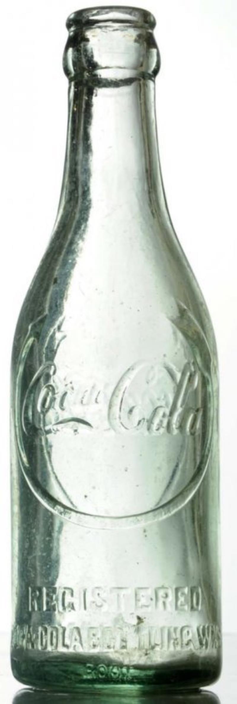 Lexington, Tenn. Curved Arrow Coca-Cola Bottle.