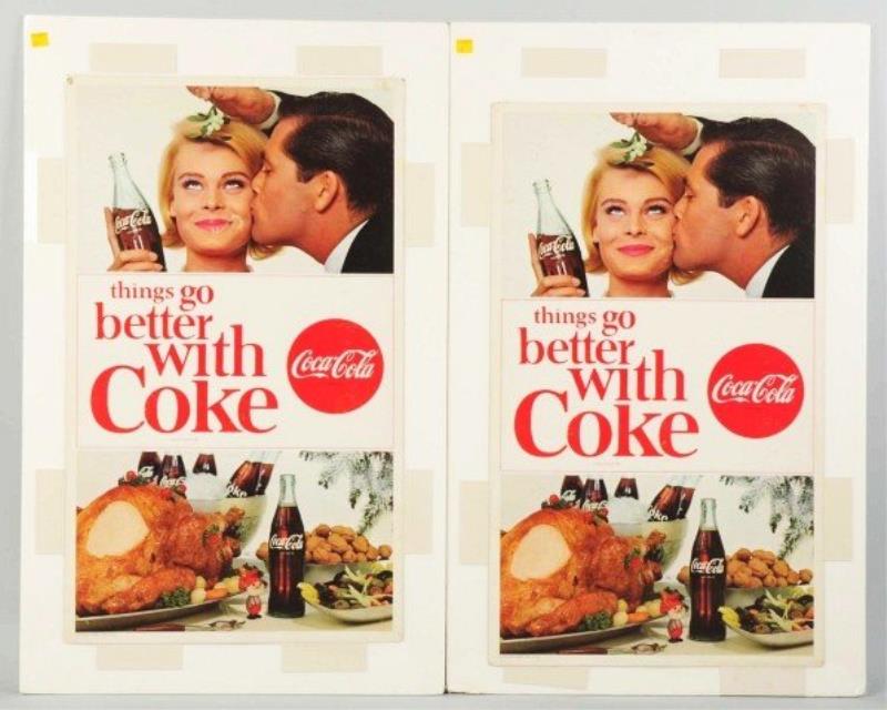 Cardboard Coca-Cola Posters.