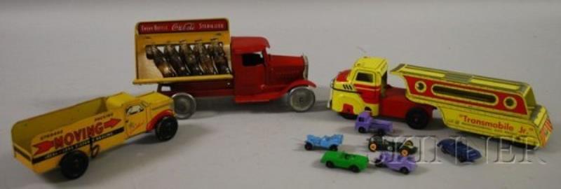 Three Metal Trucks, a Wyandotte Mansmobile, a Cour
