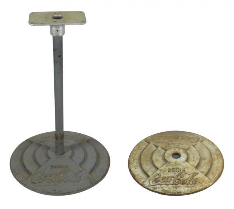 Coca-Cola sign bases (2), lollipop-style, cast iron,