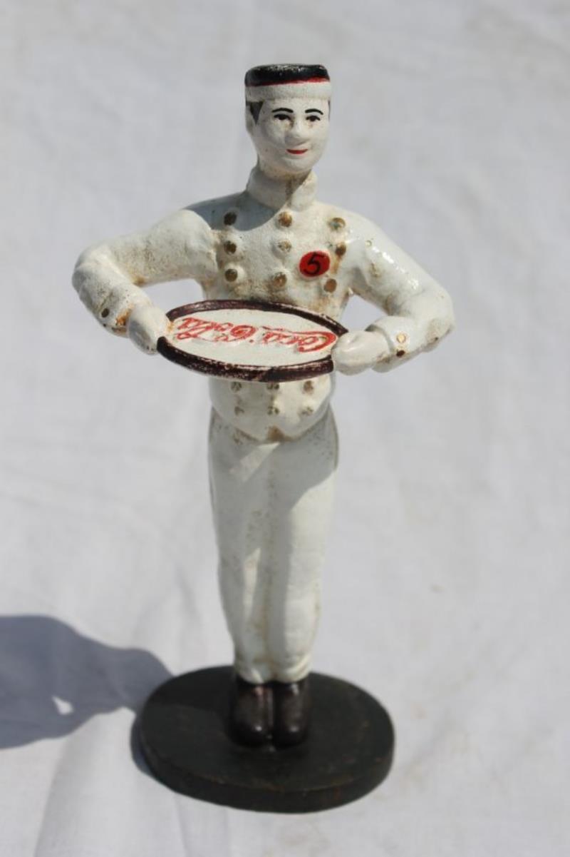 Rare ca 1898 Coca Cola bellhop/waiter cast iron