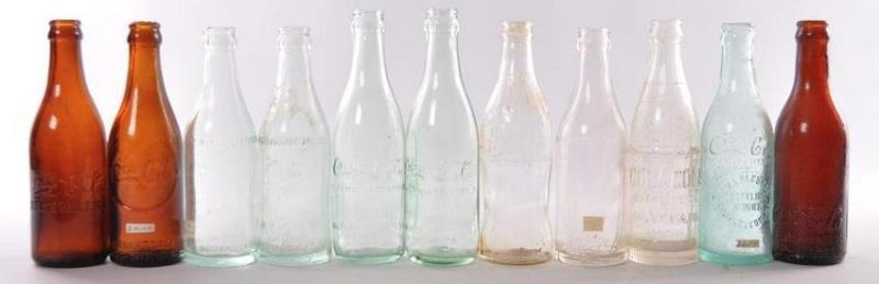 Group of 11 Vintage Coca Cola Advertising Glass Bottles