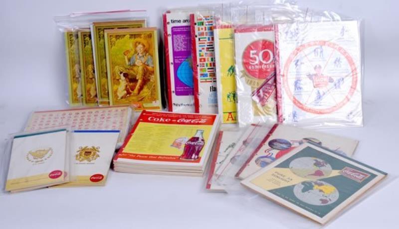 LARGE GROUP OF COCA-COLA WRITING TABLETS