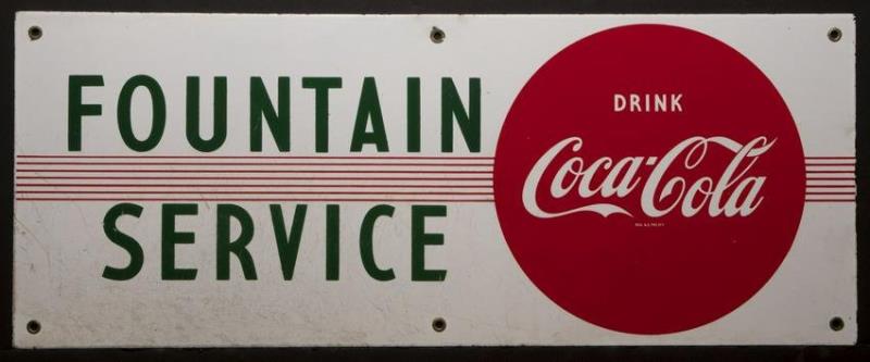 A 1950s COCA-COLA 'FOUNTAIN SERVICE' PORCELAIN SIGN