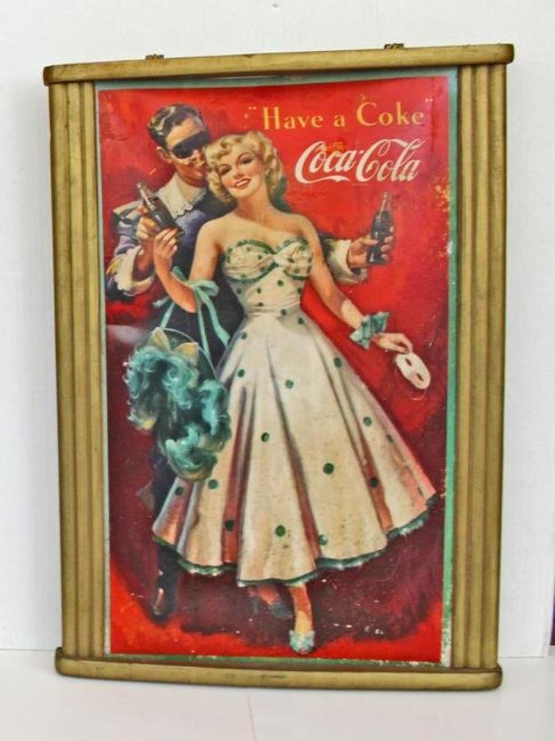 Early Coca Cola cardboard advertisement in wood frame