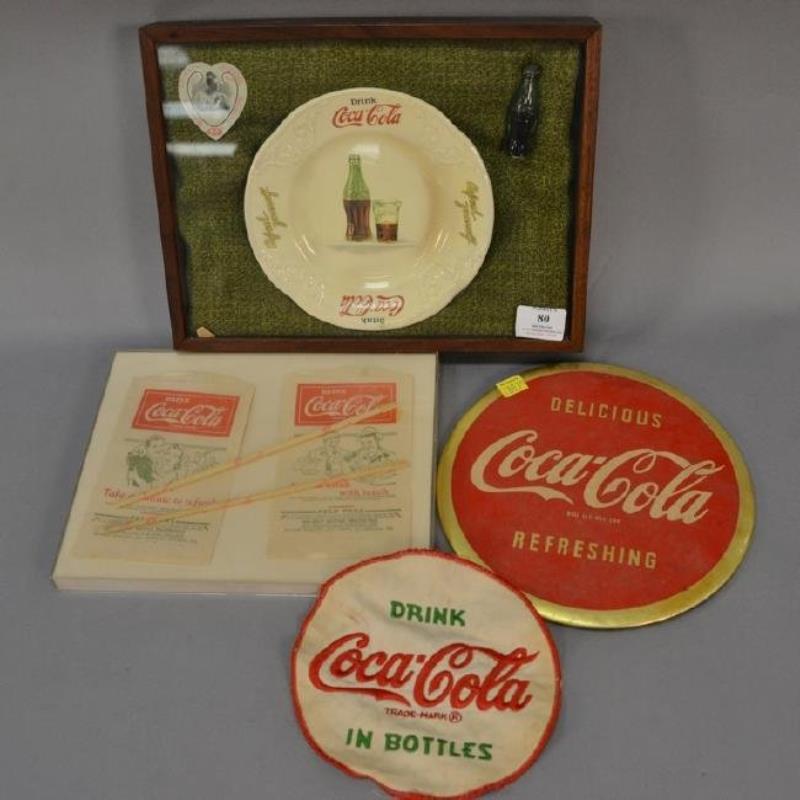 Assorted group of Coca-Cola memorabilia including