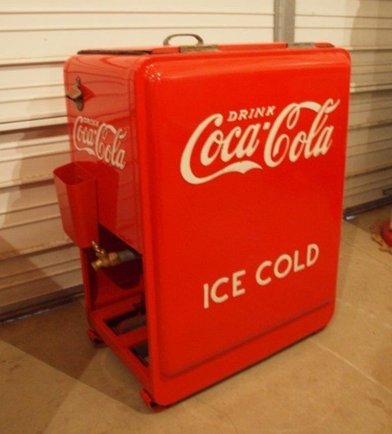 Coca Cola small size pop cooler, 25"w, 34"h, rest