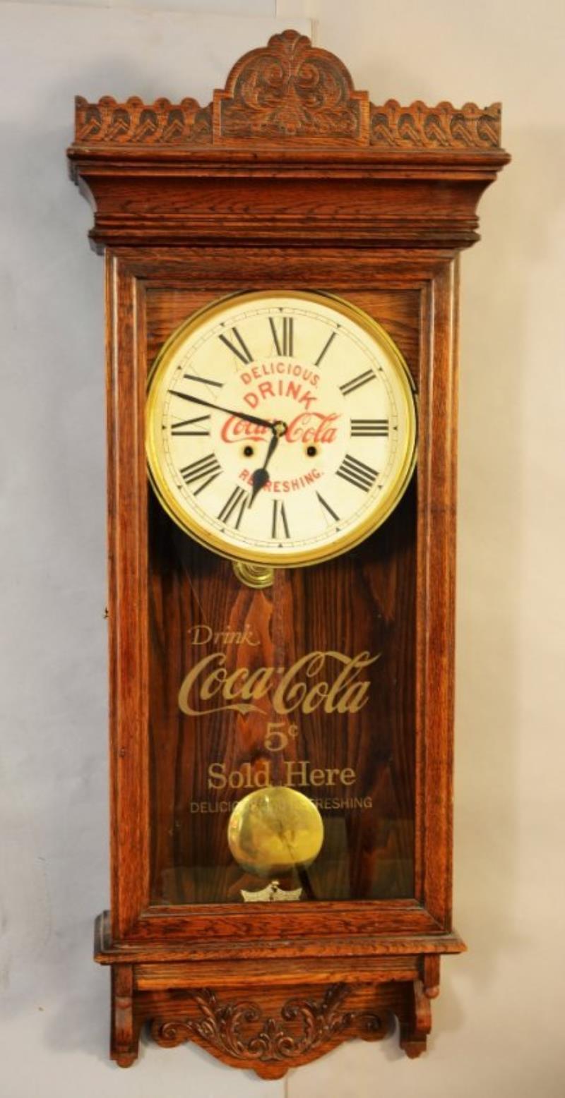 Waterbury Oak Advertising Clock