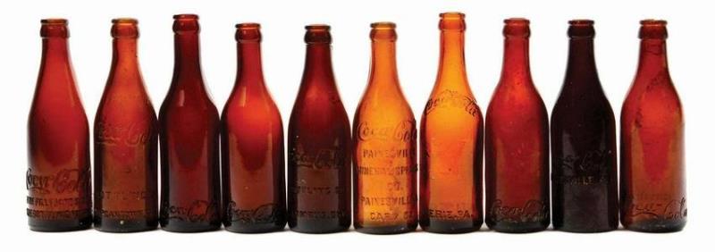 AMBER COCA-COLA BOTTLES.
