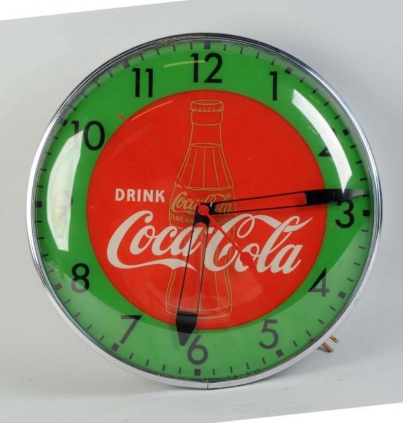 Coca-Cola Pam Light-Up Clock with Gold Bottle Value & Price Guide